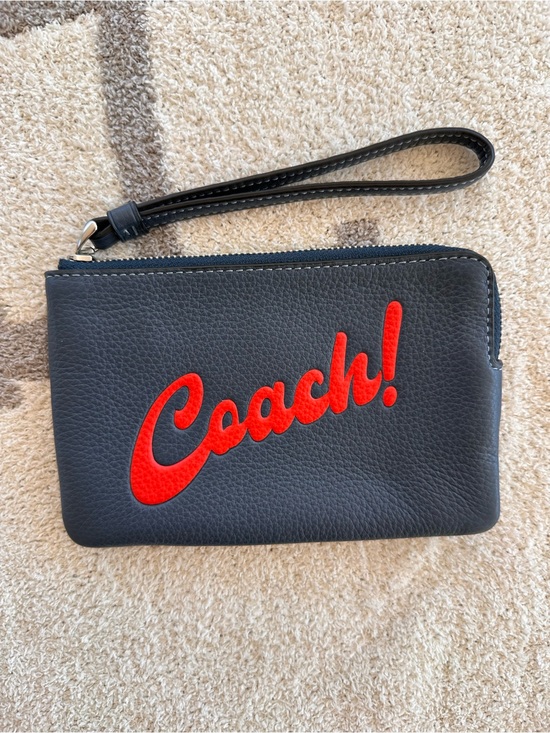 Coach Handbags - Coach Black Leather Wristlet with Red Script Logo